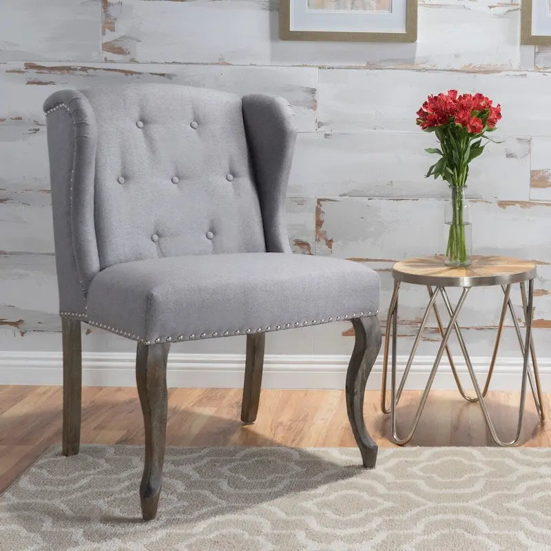 Fauteuil d'appoint en tissu clouté à oreilles de