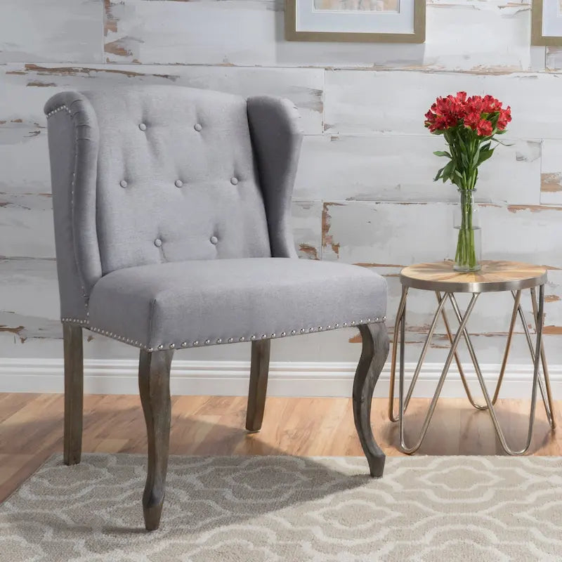 Fauteuil d'appoint en tissu clouté à oreilles de