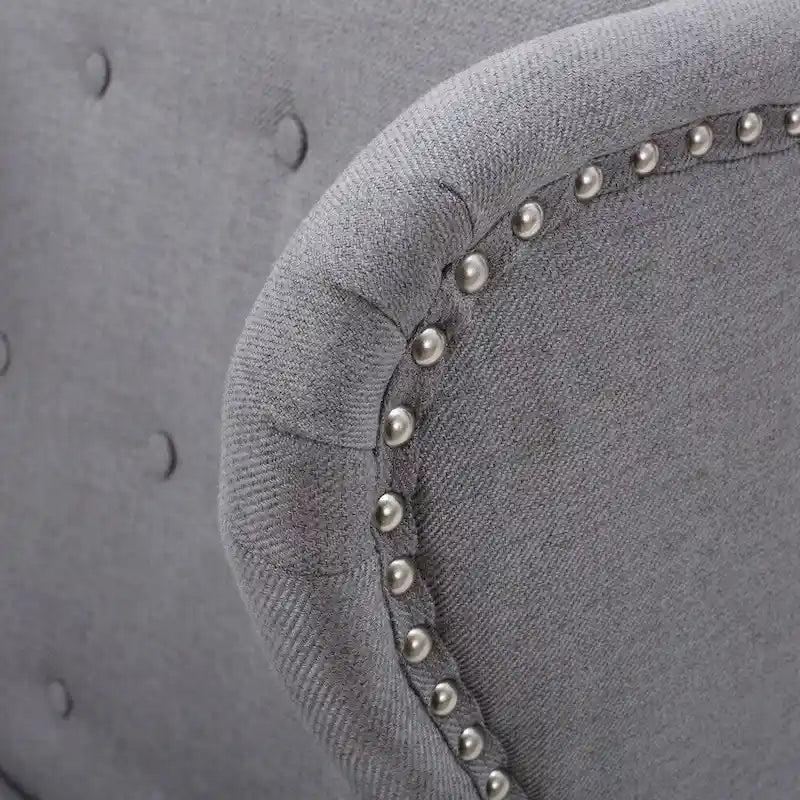 Fauteuil d'appoint en tissu clouté à oreilles de