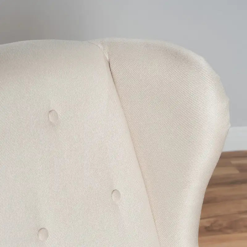 Fauteuil d'appoint en tissu clouté à oreilles de