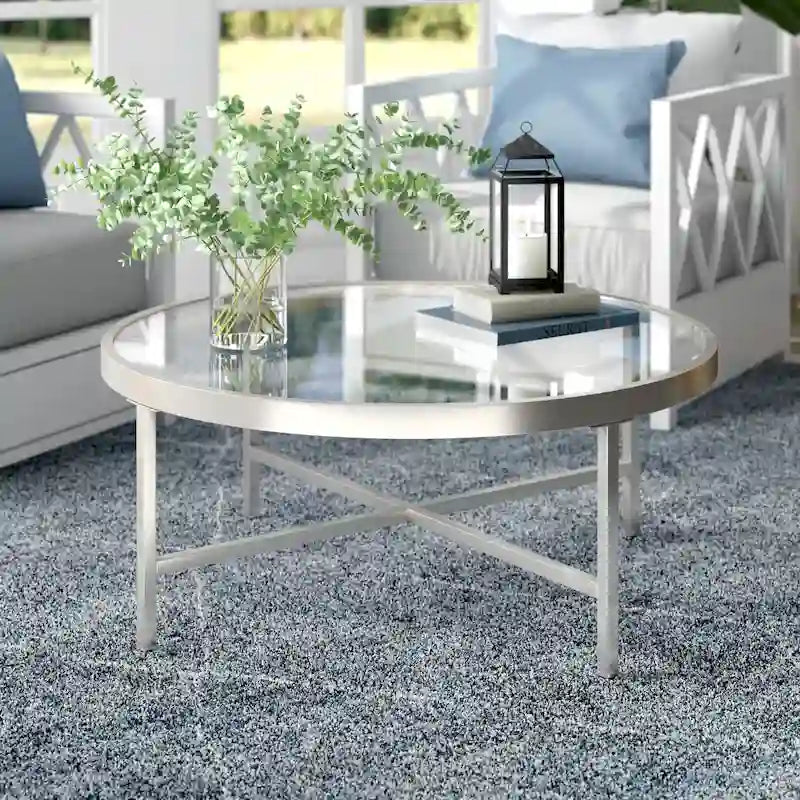 Table basse ronde contemporaine en acier avec plateau en verre