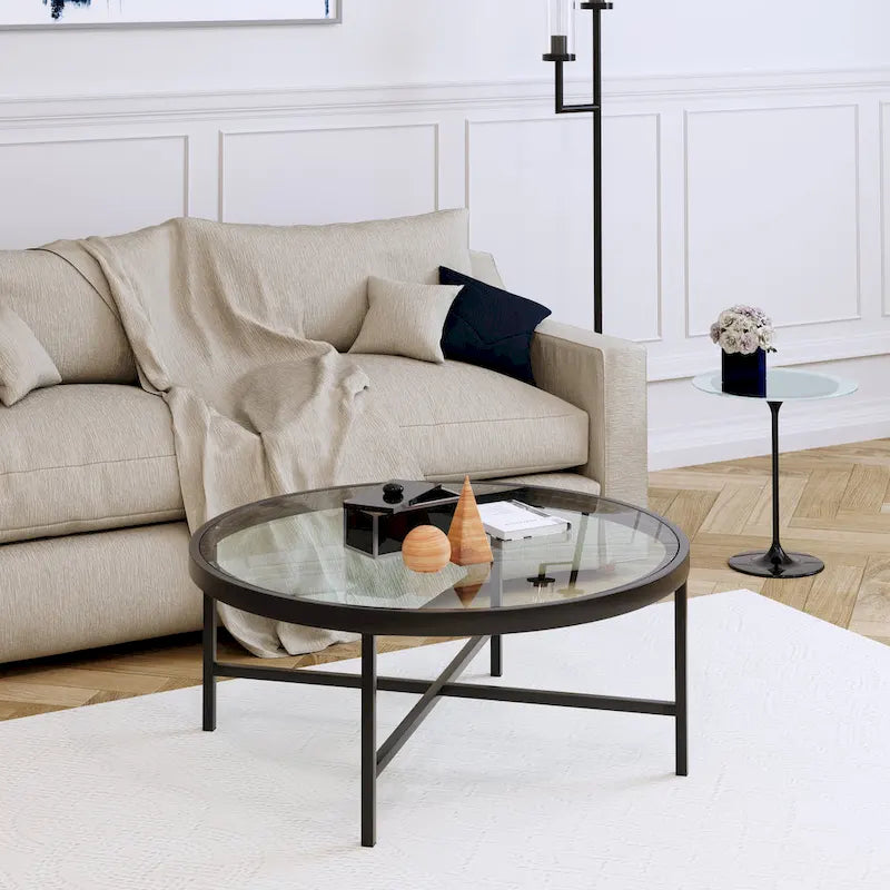 Table basse ronde contemporaine en acier avec plateau en verre