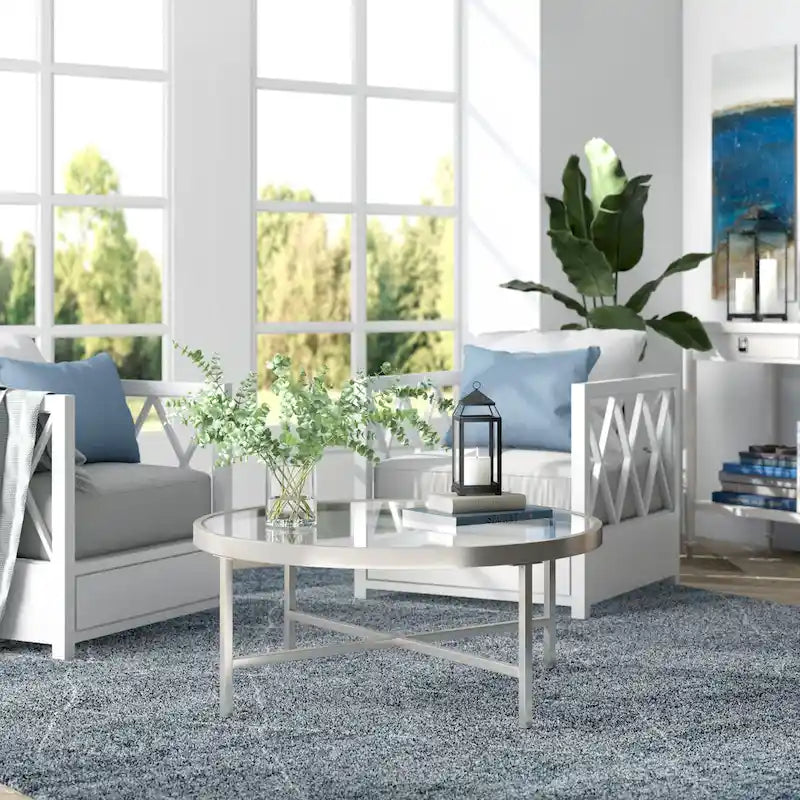 Table basse ronde contemporaine en acier avec plateau en verre